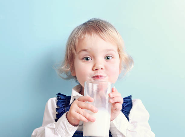 child drinking milk